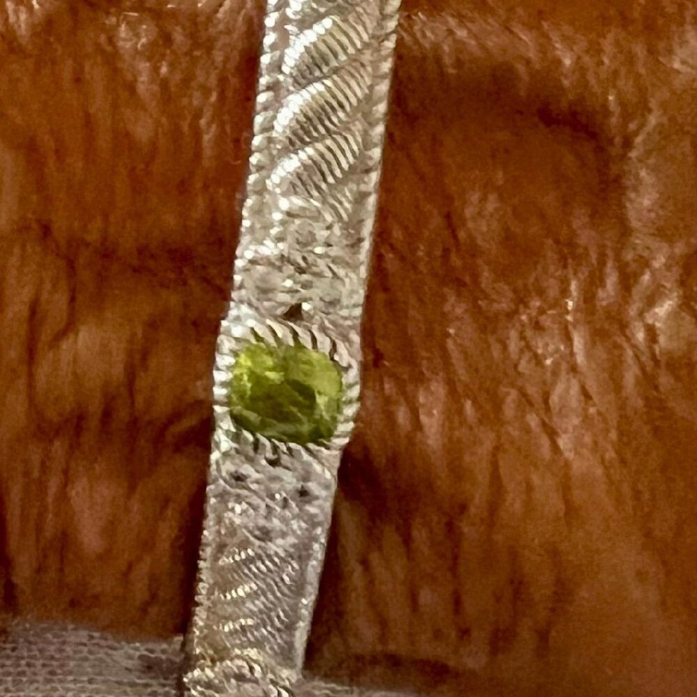 Judith Ripka oval silver bracelet with 3 peridot stones and 18 cz's